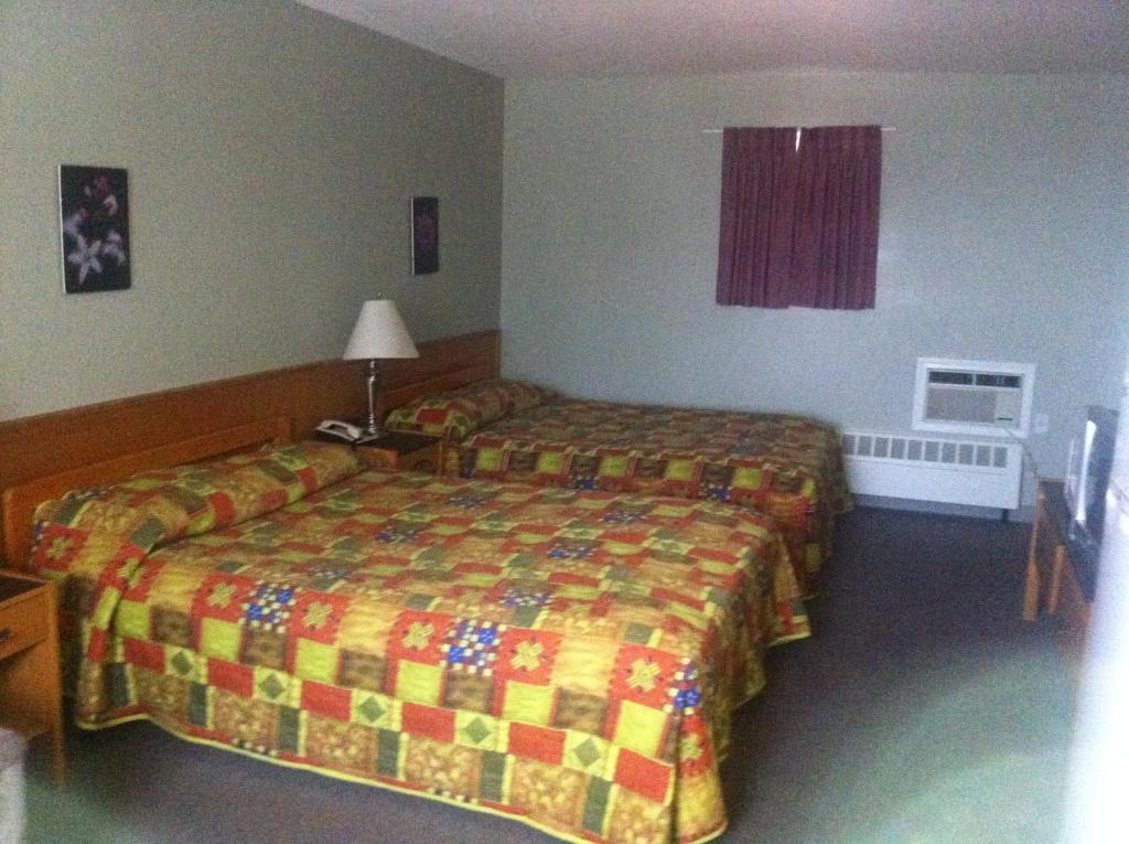 Raccoon Lodge Motel Sylvan Lake Quarto foto
