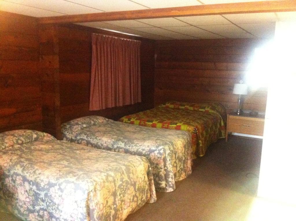 Raccoon Lodge Motel Sylvan Lake Quarto foto
